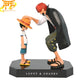 Action Figure Red Shanks con Monkey D Luffy - One Piece™